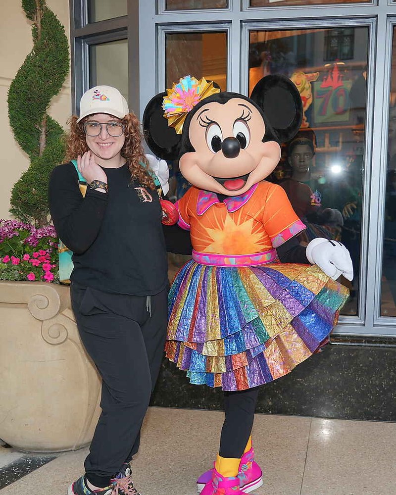 Nif, travel advisor and founder of Nifty Travel, with Minnie Mouse at the Disney parks